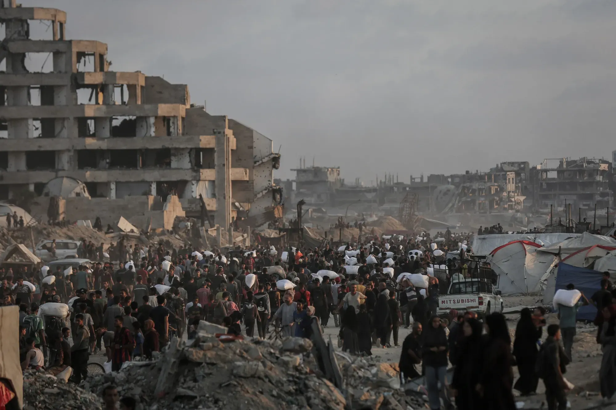 Sun setting over flattened buildings in Gaza.