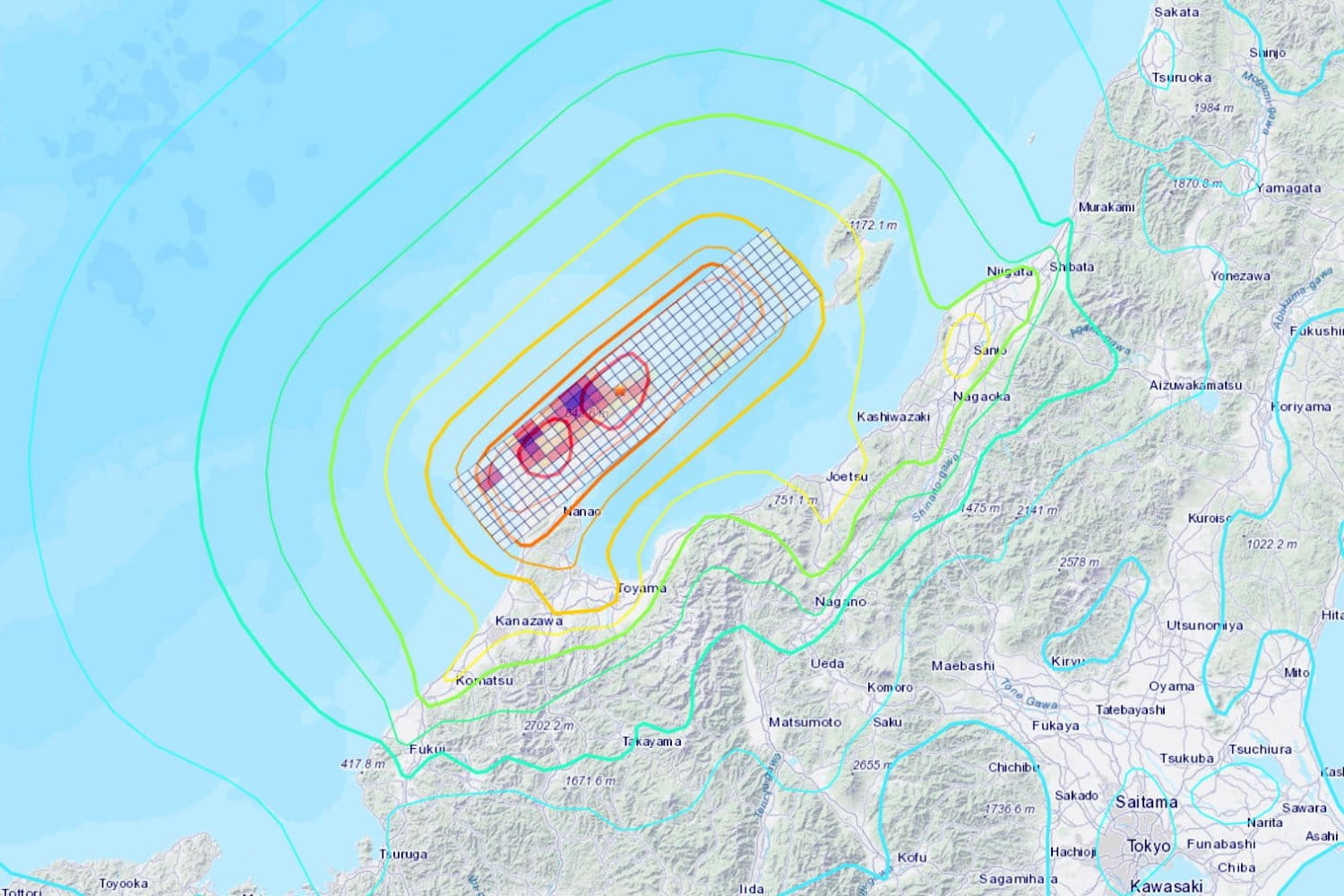 Color-coded map of Japan with concentric hazard rings illustrating earthquake strength near Kanazawa and Nanao.