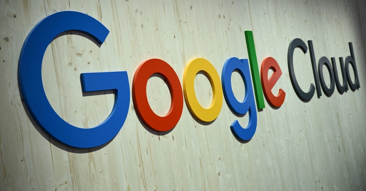Google Cloud logo displayed in colorful 3D letters on a wooden wall