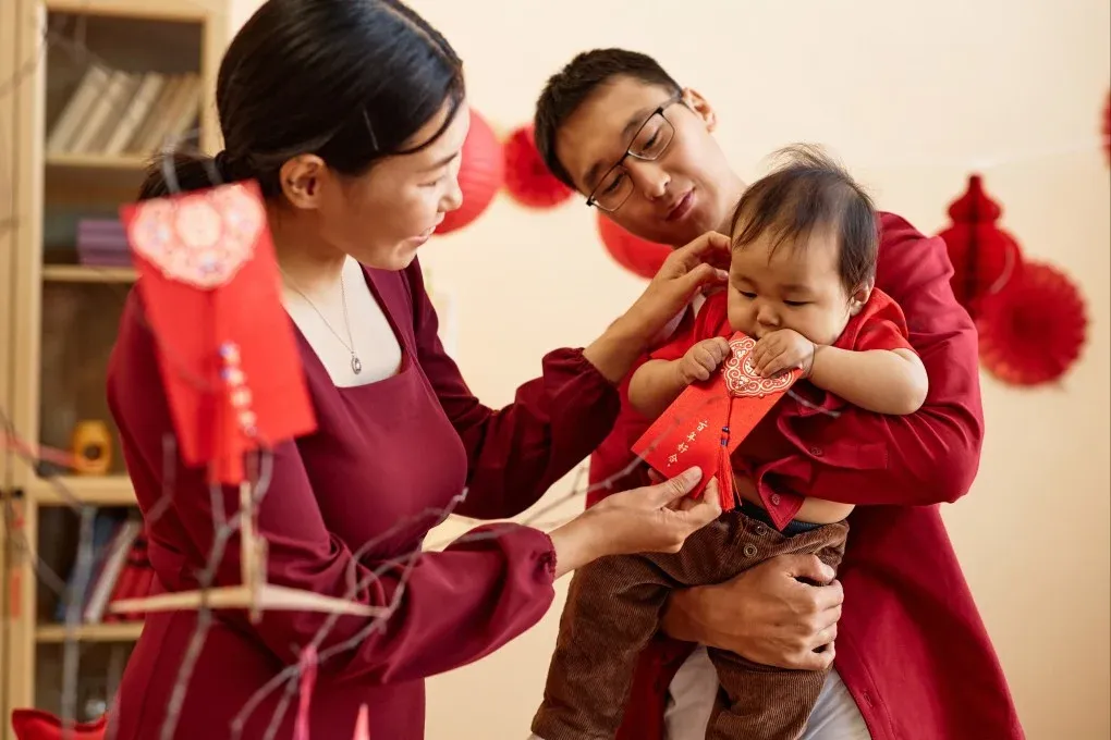 Family celebrating with their child