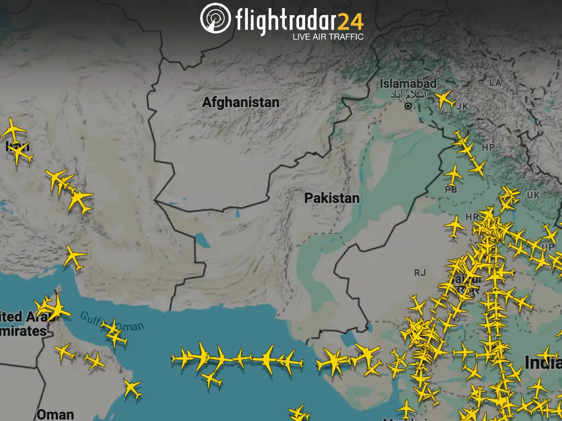 Flightradar24 live air traffic map showing numerous planes over India and the Arabian Sea, with a noticeable absence of flights over Pakistan’s airspace.