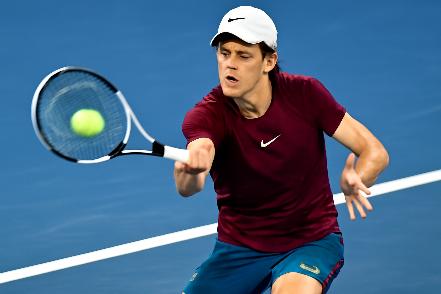 Jannik Sinner showcasing his powerful forehand
