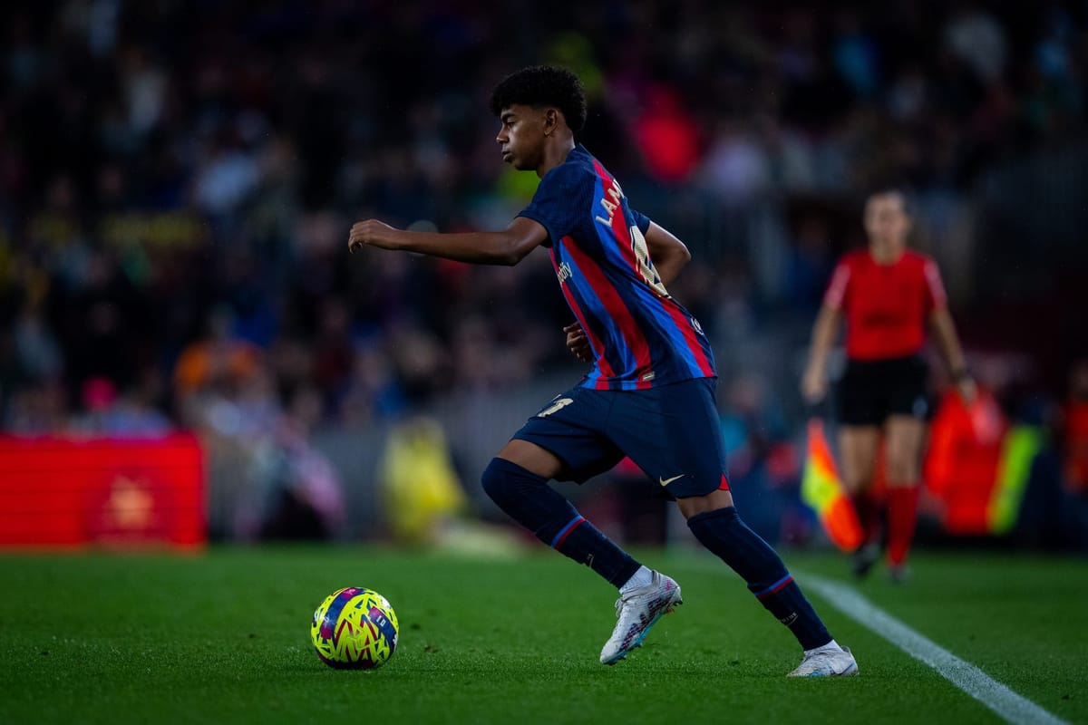 Young Yamal streaking down the wing at Camp Nou during his debut match