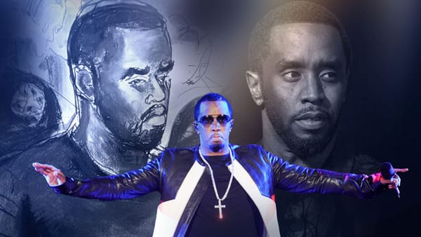 Sean Combs on stage in a leather jacket and sunglasses, arms extended confidently.