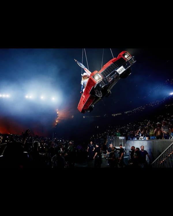 The overhead rig above the stage shifting mid-performance.