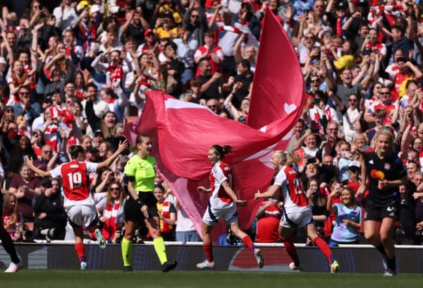 Mariona waving flags amid emotional applause, marking a sentimental farewell to her home club after a decade of devotion.